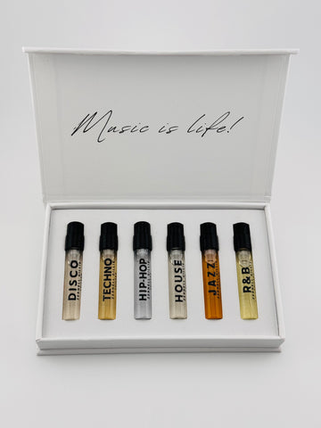 Set of six small bottles labeled with music genres in a box with 'Music is Life!' text.